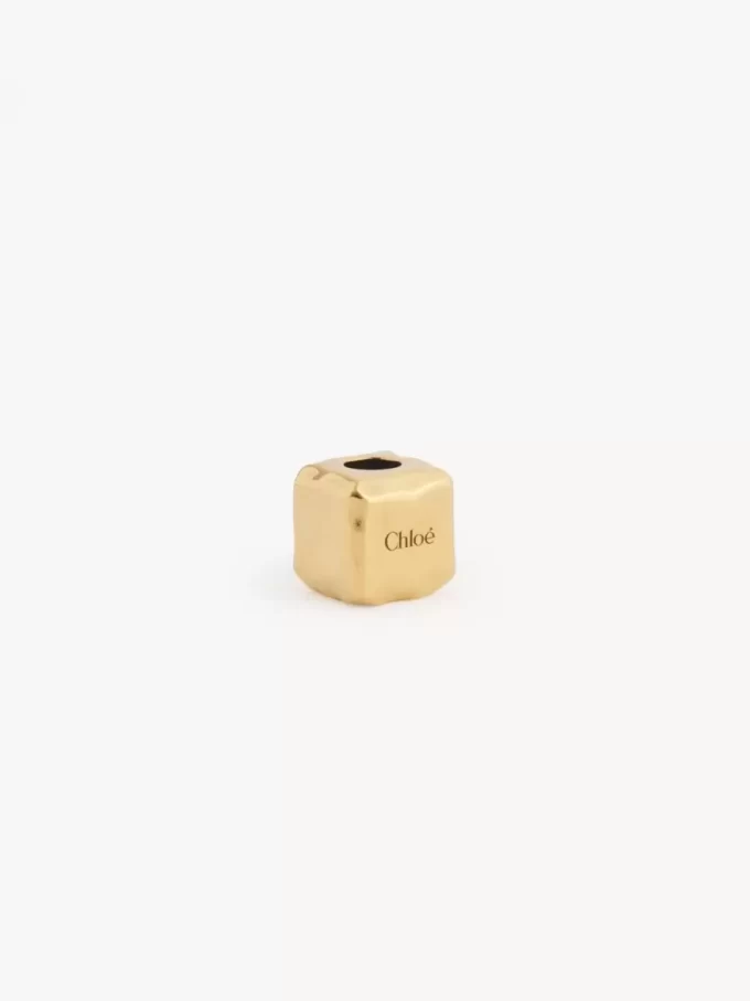 Bransoletka z zawieszką Cube Dice w kolorze mosiądzu Bransoletka z zawieszką Cube Dice w kolorze mosiądzu
