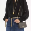 Chloé Iconic portfel z klapką na łańcuszku z błyszczącej skóry
