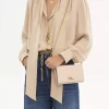 Chloé Iconic portfel z klapką na łańcuszku z błyszczącej skóry