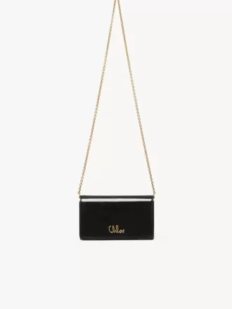 Chloé Iconic portfel z klapką na łańcuszku ze skóry lakierowanej