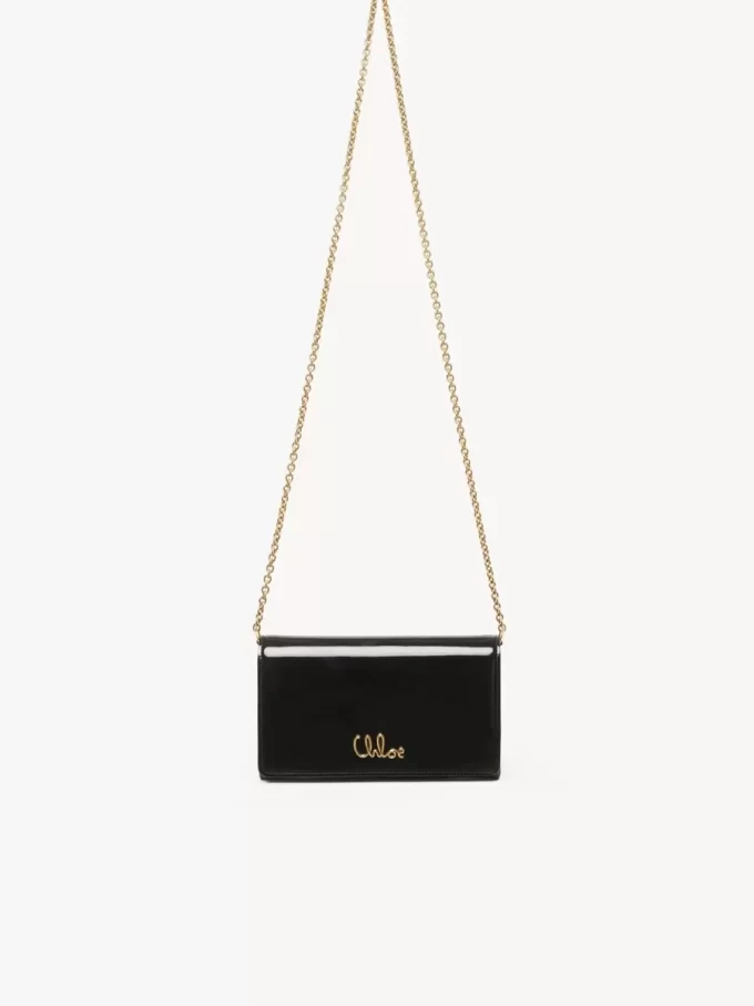 Chloé Iconic portfel z klapką na łańcuszku ze skóry lakierowanej