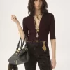 Dopasowany kardigan z dekoltem w serek z wełnianej dzianiny Dopasowany kardigan z dekoltem w serek z wełnianej dzianiny
