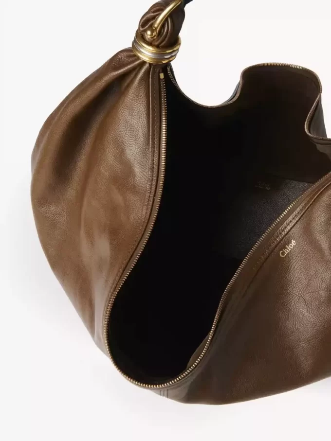 Duża torba typu hobo z bransoletą ze skóry licowej Duża torba typu hobo z bransoletą ze skóry licowej