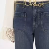 Jeansy typu bootcut z krótkim rękawem i denimu Jeansy typu bootcut z krótkim rękawem i denimu