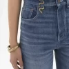 Jeansy z wysokim stanem i rozszerzanymi nogawkami typu bootcut z denimu