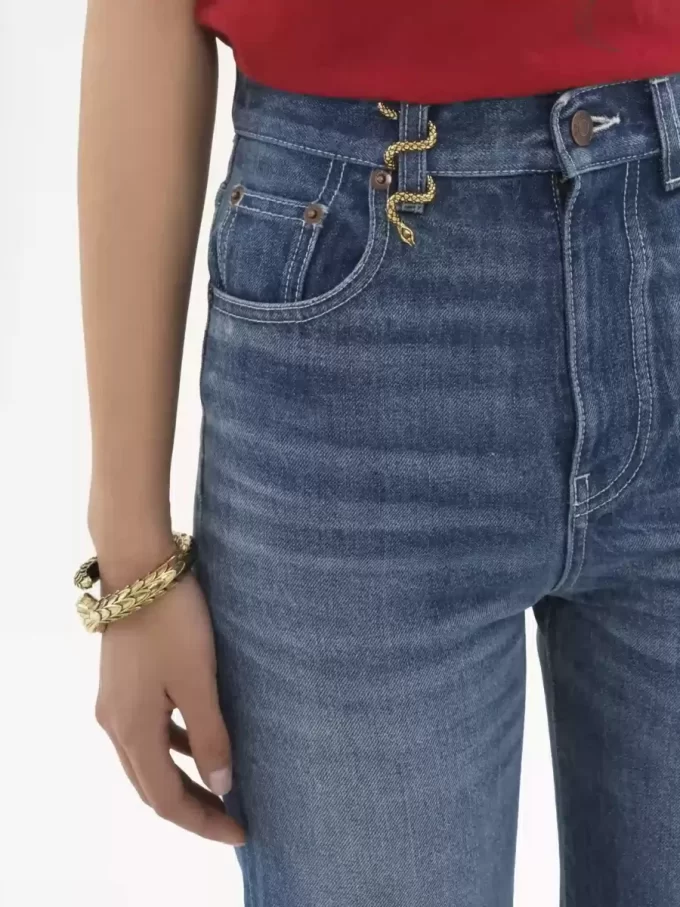 Jeansy z wysokim stanem i rozszerzanymi nogawkami typu bootcut z denimu