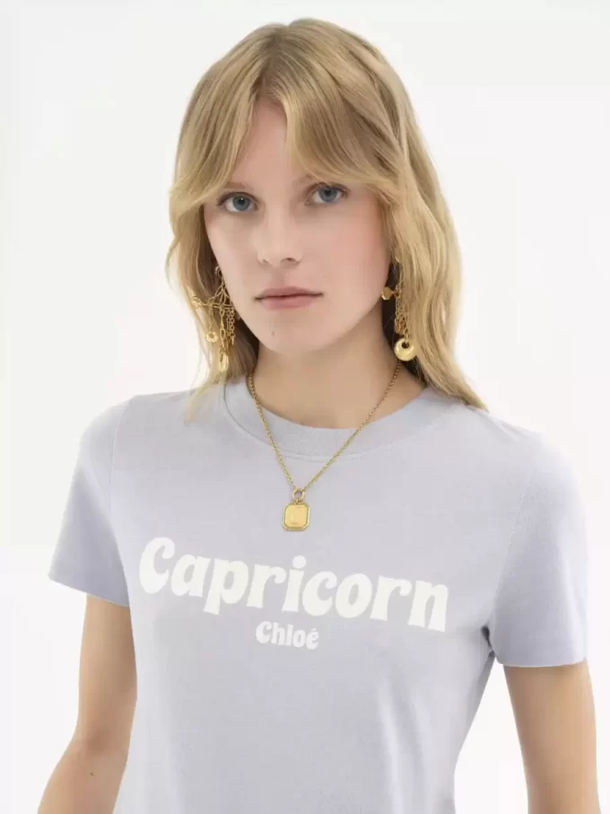 Koszulka niemowlęca Capricorn T-shirt z bawełnianej dzianiny Koszulka niemowlęca Capricorn T-shirt z bawełnianej dzianiny