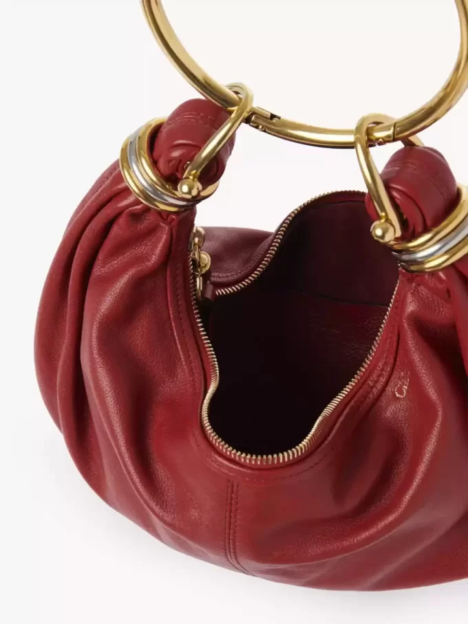 Mała torba typu hobo z bransoletką ze skóry licowej Mała torba typu hobo z bransoletką ze skóry licowej