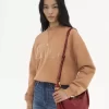 Mała torba typu hobo z bransoletką ze skóry licowej Mała torba typu hobo z bransoletką ze skóry licowej