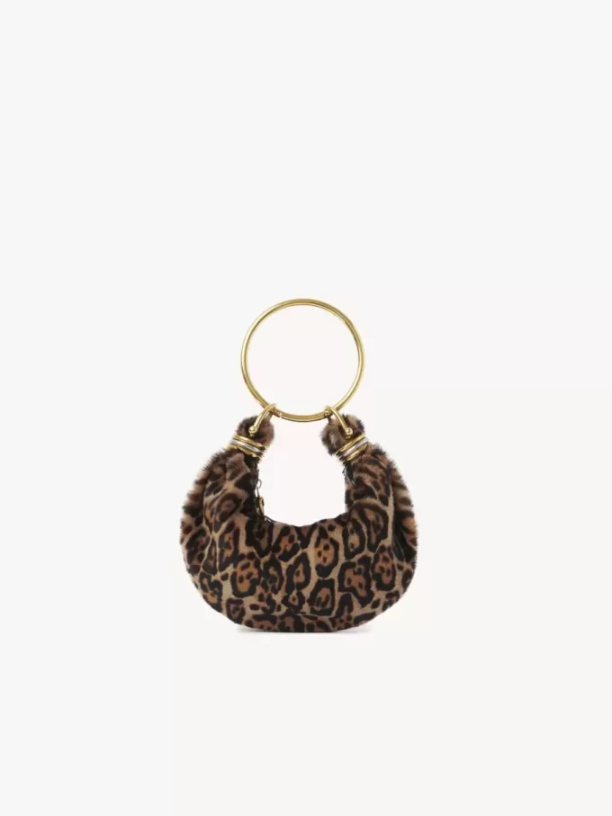 Mini torebka typu hobo z bransoletką z owczej skóry w panterkę Mini torebka typu hobo z bransoletką z owczej skóry w panterkę