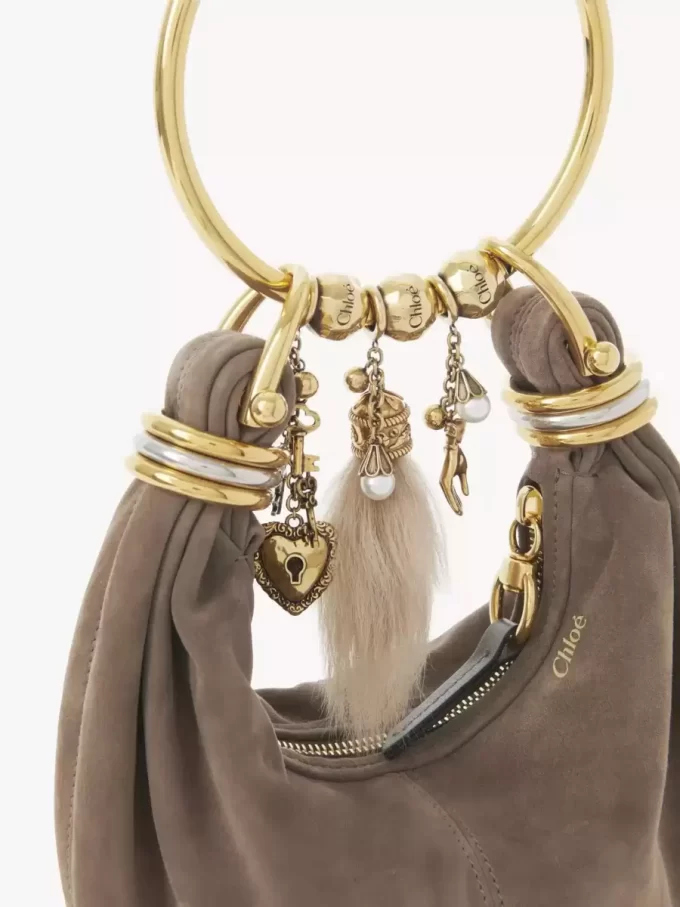 Mini torebka typu hobo z bransoletką ze skóry zamszowej Mini torebka typu hobo z bransoletką ze skóry zamszowej