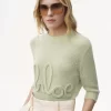 Sweter z logo i rękawami do łokcia, wykonany z dzianiny z wełny alpaki i jedwabiu Sweter z logo i rękawami do łokcia, wykonany z dzianiny z wełny alpaki i jedwabiu