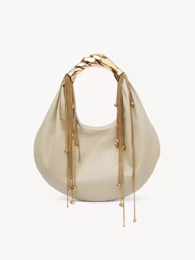 Torba typu hobo Twisted Shell z błyszczącej skóry Torba typu hobo Twisted Shell z błyszczącej skóry