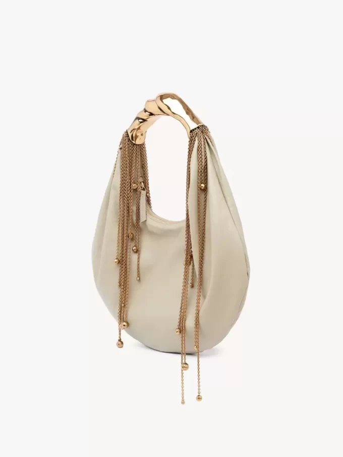 Torba typu hobo Twisted Shell z błyszczącej skóry Torba typu hobo Twisted Shell z błyszczącej skóry