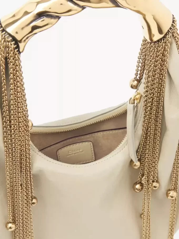 Torba typu hobo Twisted Shell z błyszczącej skóry Torba typu hobo Twisted Shell z błyszczącej skóry