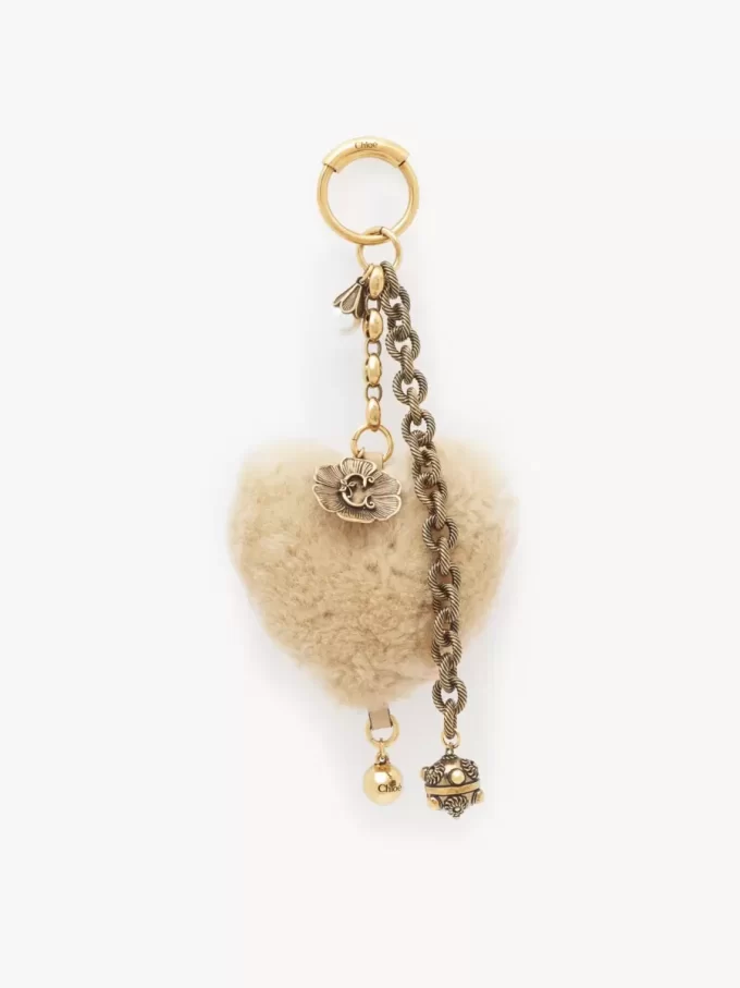 Zawieszka do torebki Chloé Symbols Heart Shearling z mosiądzu Zawieszka do torebki Chloé Symbols Heart Shearling z mosiądzu